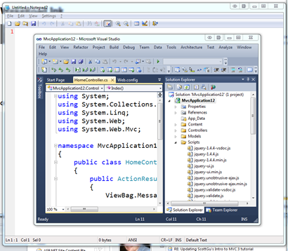 Notepad open behind Visual Studio