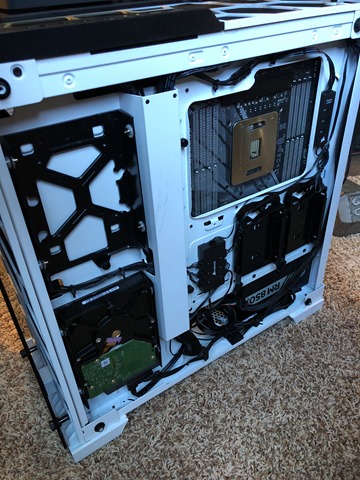 The backside of the clear white corsair case